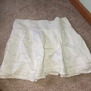 White flowy mini skirt